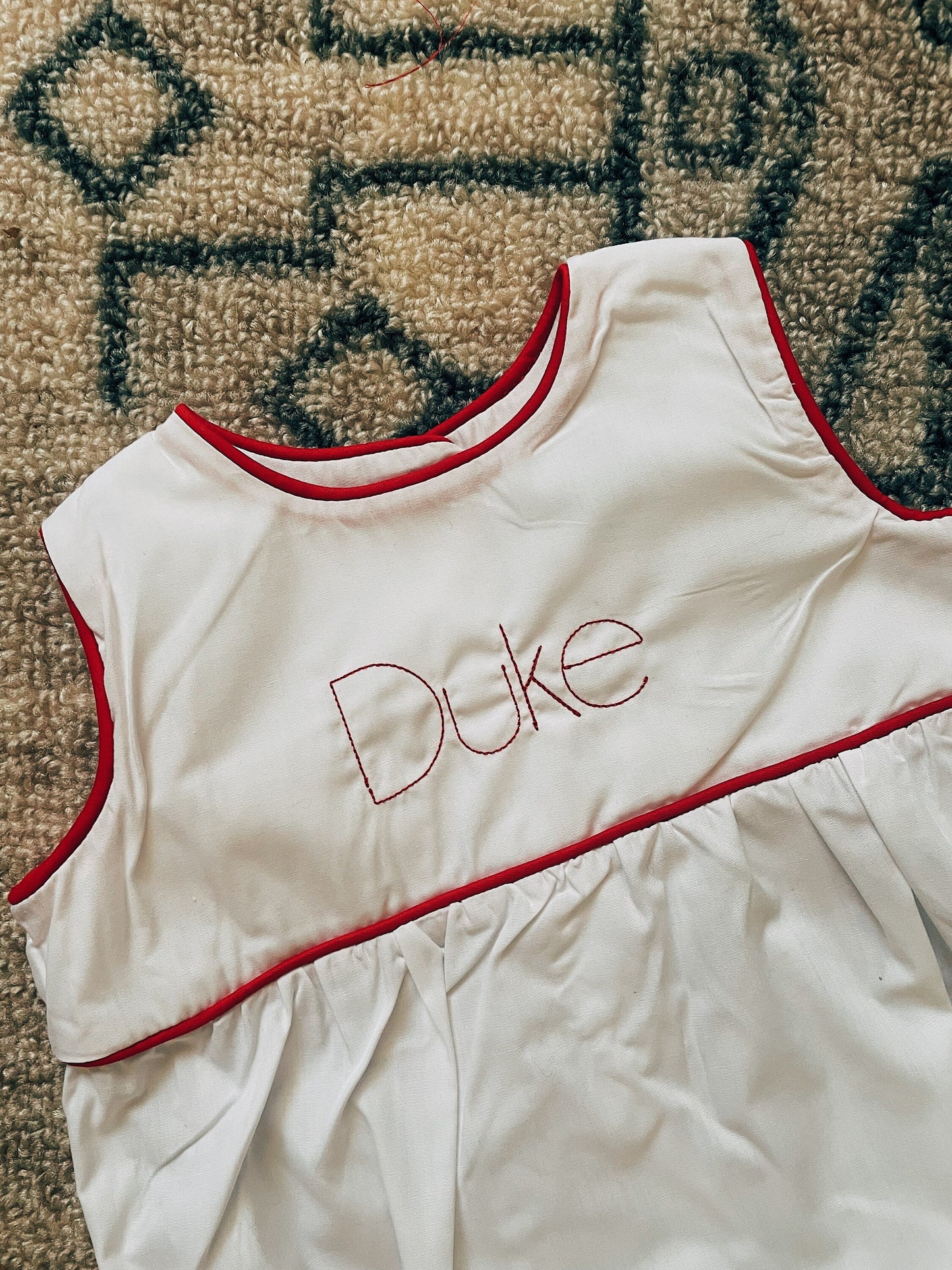 White Bubble Onesie With Red Trim